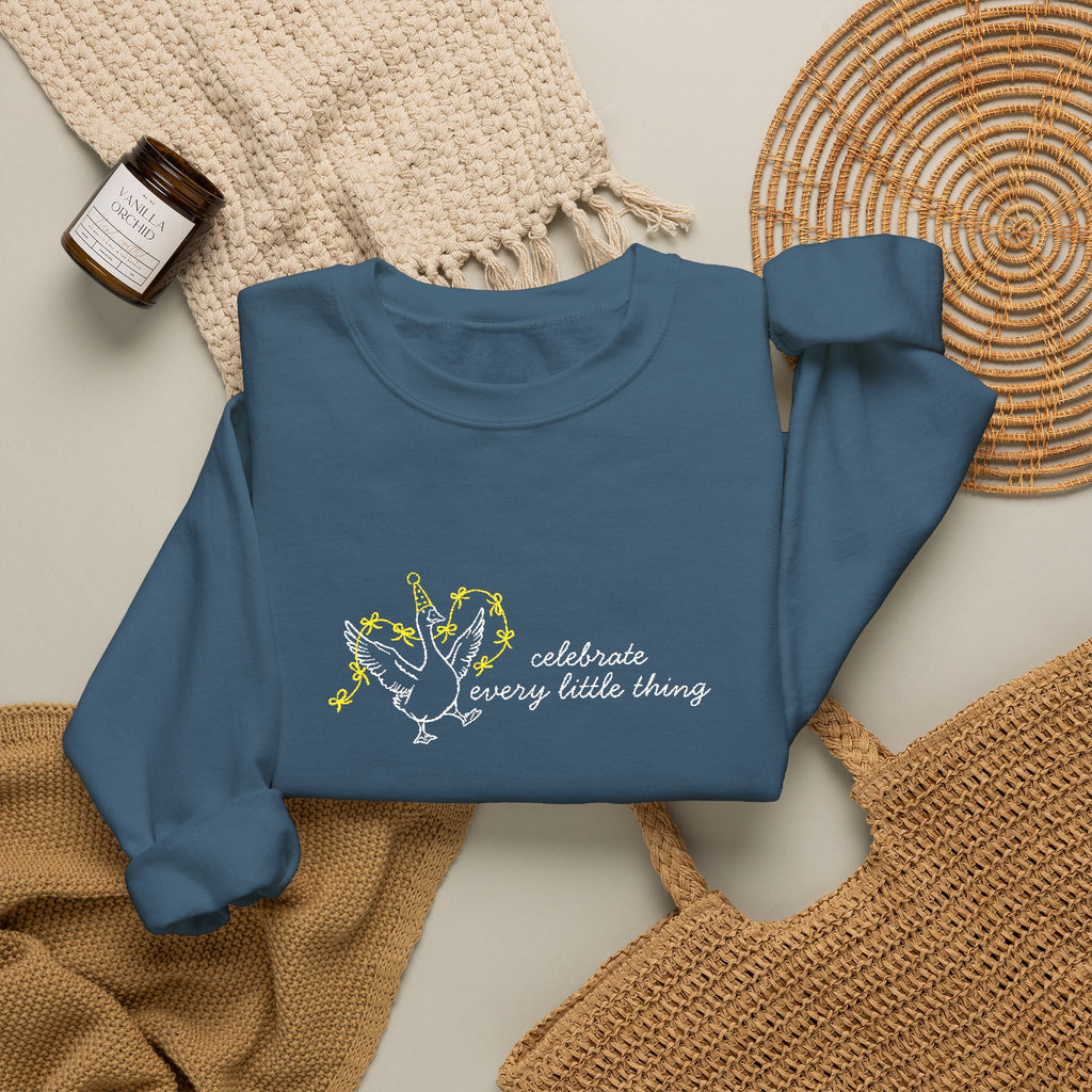 Celebrate Embroidered Goose Unisex Heavy Blend™ Crewneck Sweatshirt