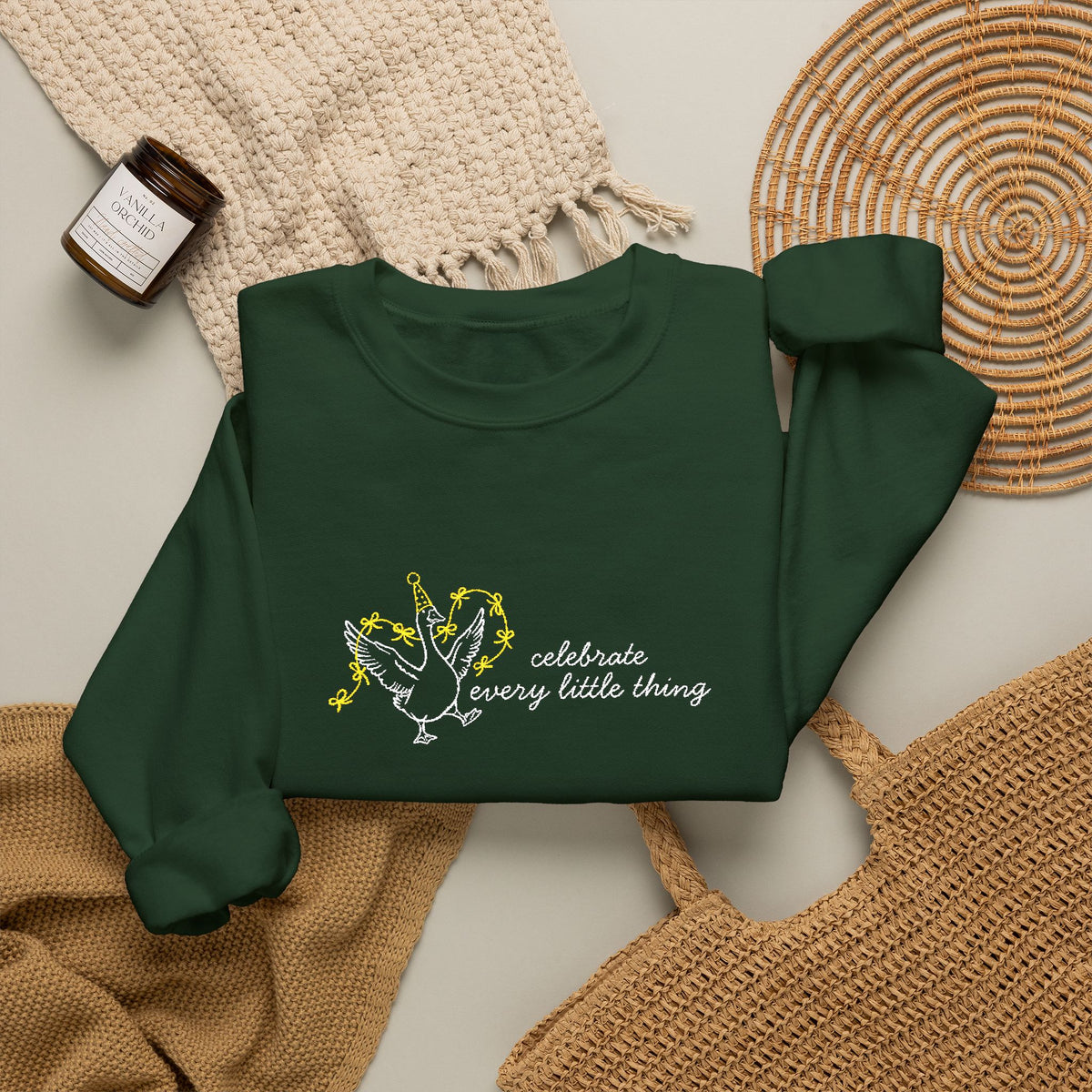 Celebrate Embroidered Goose Unisex Heavy Blend™ Crewneck Sweatshirt