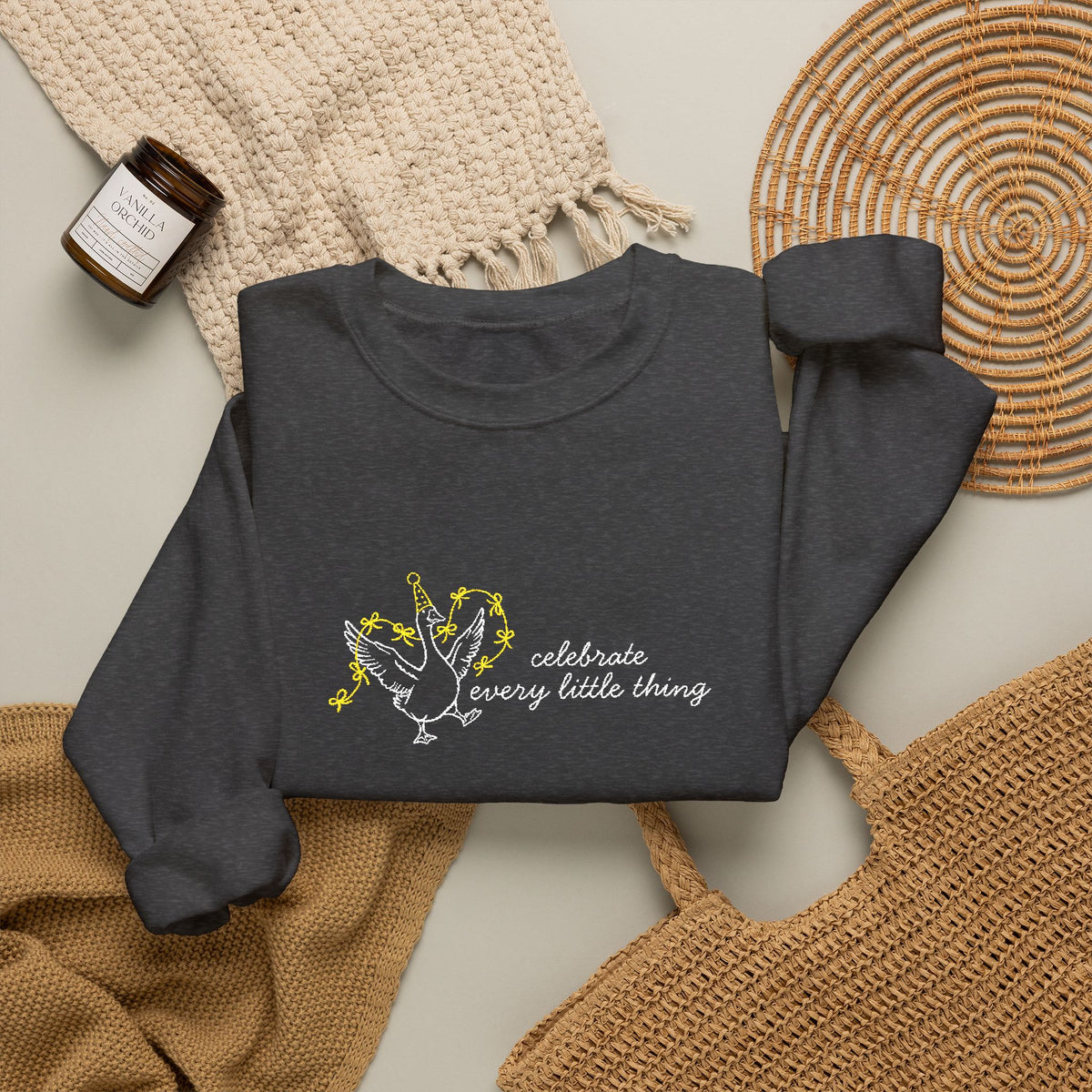 Celebrate Embroidered Goose Unisex Heavy Blend™ Crewneck Sweatshirt