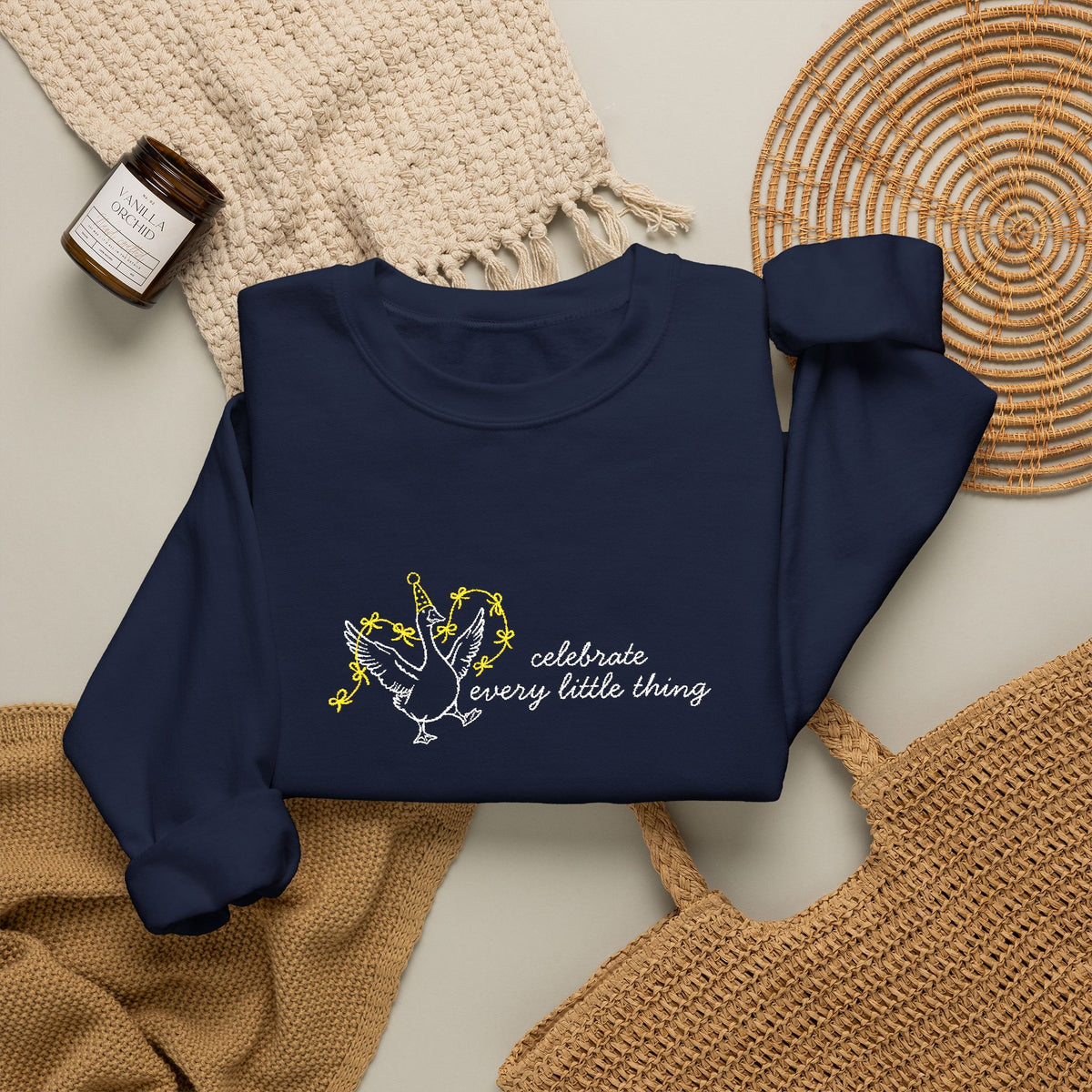 Celebrate Embroidered Goose Unisex Heavy Blend™ Crewneck Sweatshirt