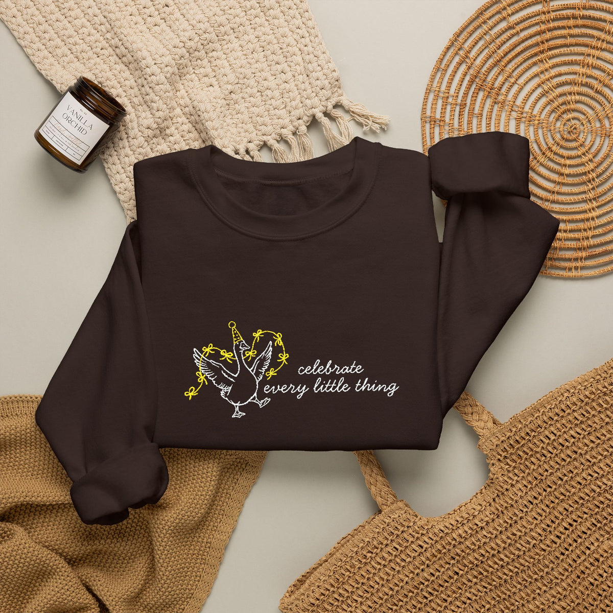 Celebrate Embroidered Goose Unisex Heavy Blend™ Crewneck Sweatshirt